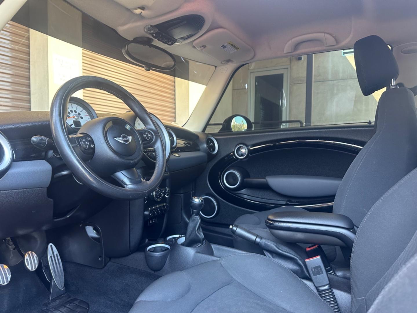 2012 Black /Black Mini Cooper Cloth (WMWSV3C52CT) with an 4Cylinder engine, Manual transmission, located at 30 S. Berkeley Avenue, Pasadena, CA, 91107, (626) 248-7567, 34.145447, -118.109398 - Tank : 13.20 Anti-Brake System : 4-Wheel ABS Steering Type : Rack and Pinion Front Brake Type : Disc Rear Brake Type : Disc Turning Diameter : 35.10 Front Suspension : Ind Rear Suspension : Ind Front Spring Type : Coil Rear Spring Type : Coil Tires : 195/55R16 Front Headroom : 38.80 Re - Photo#11